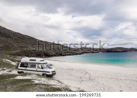 Camper van parked on a beach in the Isle of Lewis, Outer Hebrides, Scotland, UK.