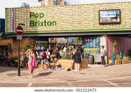 London, UK - 11 July 2015: People enjoying the London summer in a new pop-up opened in Brixton called \