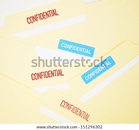 Confidential files.  Confidential files concept for proprietary business information, data privacy and security, legal settlement or breach.