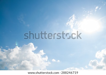 flare in blue sky and clouds