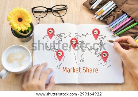 Business write market share on notebok.