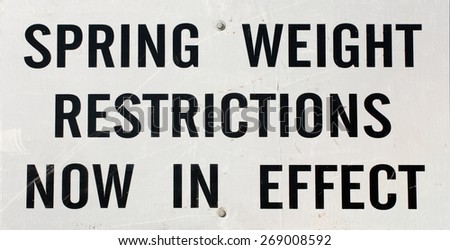 Closeup view of Spring weight restriction highway sign