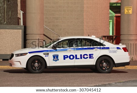 DARTMOUTH, CANADA - AUGUST 16, 2015: Halifax Regional Police cruiser at night. The Halifax Regional Police serves the Halifax Regional Municipality along with other law enforcement agencies.