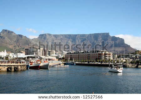 Cape Town Harbour overlooked by Table Mountain (South Africa)