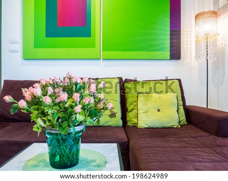 Modern elegance living room with geometric green toned painting