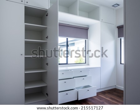 Modern apartment interior with walk in wardrobe