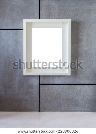 Blank white hanging picture frame on modern wall, background