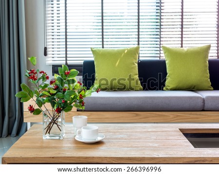 Modern interior of Living room with flower vase and sofa background