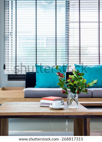 Modern interior of Living room still life with flower vase and sofa background