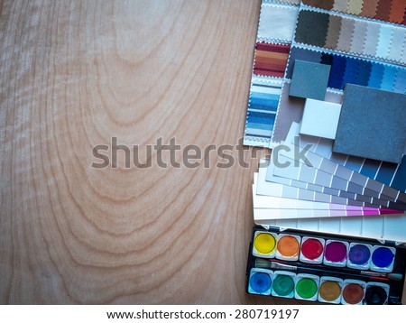 Top view of interior material sample with copy space on wooden table top