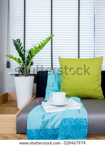 Interior design of couch with flower vase in modern Living room/ home improvement concept