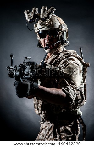 soldier man hold Machine gun fashion