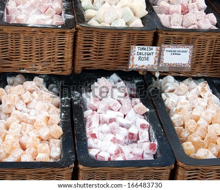Turkish delight dessert candy sweets on display at market stall.