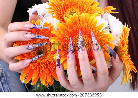 manicured acrylic nails with flowers