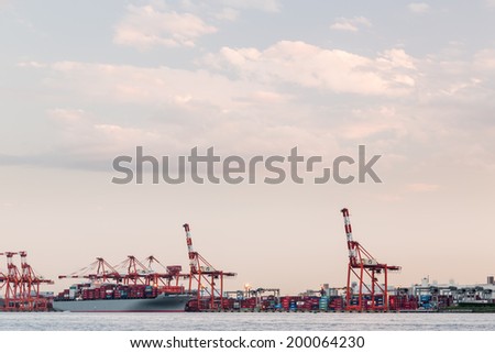 TOKYO - CIRCA JUNE 2014: Odaiba sea port with cranes. Odaiba is Tokyo\'s sea port on circa June 2014