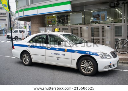TOKYO, JAPAN - CIRCA August, 2014:  Various luxurious car models are used as taxis in Japan. Toyota Crown pictured.
