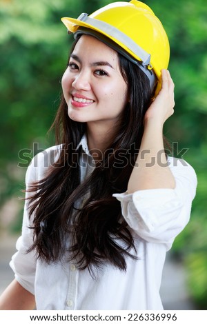 Professional engineer woman with hard hat