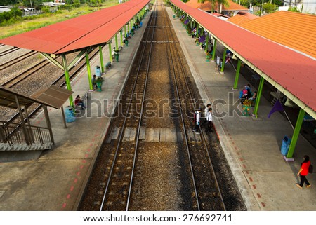 BANGKOK, THAILAND - CIRCA MAY, 2015: Studends cross rail ways near King Monkut Institute of Technology. Rails are the main transport of students from this institute.