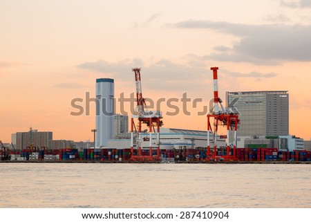 ODAIBA, TOKYO, JAPAN - CIRCA JUNE 2014: Cranes as seen at Odaiba sea port. Odaiba sea port is an important port in the bay of Japan