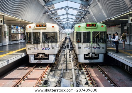 TOKYO, JAPAN - CIRCA JULY 2014: Japanese trains at a station. Train is the main method of transportation in Japan.