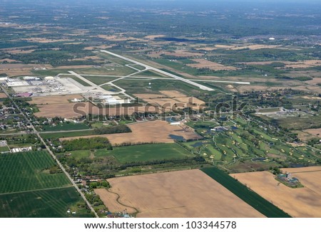 aerial view of a Golf Course located on Upper James Street on the outskirts of Hamilton, Ontario, with the Hamilton Airport in the background