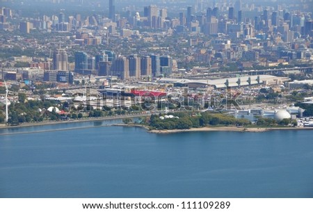 TORONTO, CANADA - AUG 24 : Aerial view of the Exhibition Grounds during the Canadian National Exhibition with Toronto skyline in the background,  Toronto Ontario Canada August 24, 2012