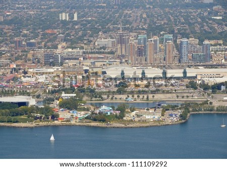 TORONTO, CANADA - AUG 24 : Aerial view of the Exhibition Grounds during the Canadian National Exhibition with Canada Place in the foreground, Toronto Ontario Canada August 24, 2012
