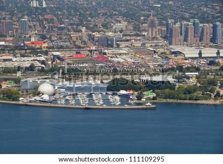 TORONTO, CANADA - AUG 24 : Aerial view of the Exhibition Grounds during the Canadian National Exhibition with Canada Place in the foreground, Toronto Ontario Canada August 24, 2012