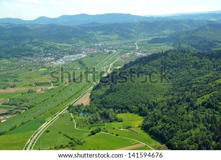 aerial view into the Kinzig Valley with Gengenback and the Black Forest in the background, Baden Germany