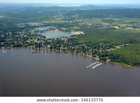 aerial view of Pointe-Calumet, Quebec, located in the  Deux-Montagnes Regional County  along the  RiviÃ?Â¨re des Mille Ã?Â?les; Lake des Sables with the water park in the background