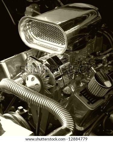 close up of a high performance car engine, sepia tones