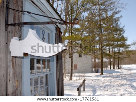 shoe makers sign on building, Winter scene