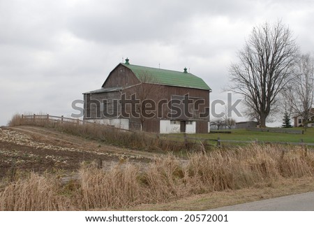 agricultural building surrounded by farmland