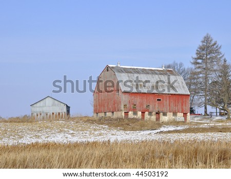 red barn on a sunny Winter\'s day