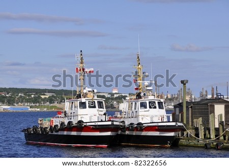 two Pilot boats anchored at the Pier at the Halifax Harbour, Nova Scotia Canada