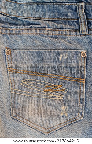 Blue used jeans back pocket with embroidery