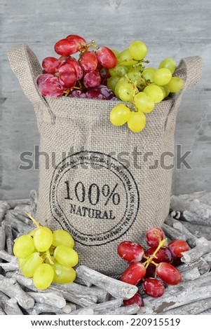 Natural grapes in a jute bag
