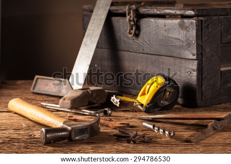 Still life Work tools chest on a wooden table