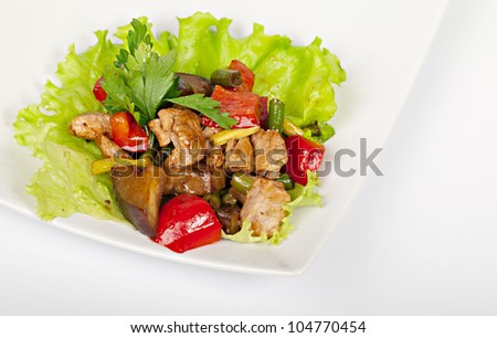 Pork with a  vegetables on the plate. National food.