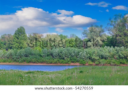 landscape depicting the river and fields in good warm weather