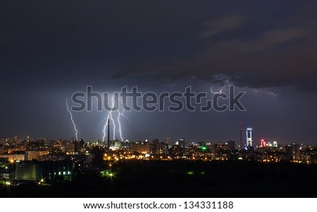 thunderstorm over night city