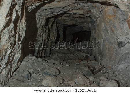 Old mine tunnel. Abandoned old mine.