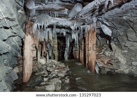Old tunnel in mine with ice