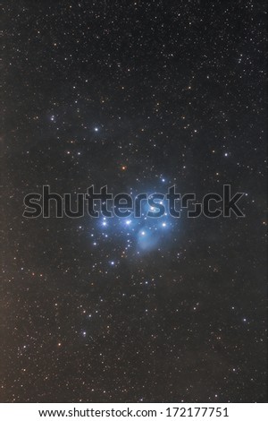 Star cluster with nebulosity in a zodiac constellation of the Bull.