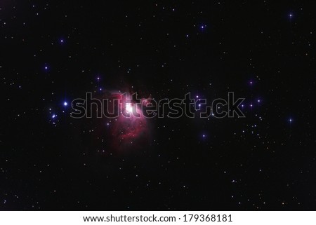 Famous Orion nebula with cross-shaped stars.