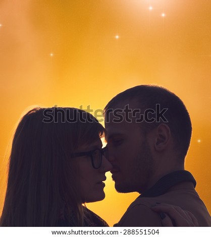 Silhouettes of a couple with starry and lunar background. Stars are my astronomy work.