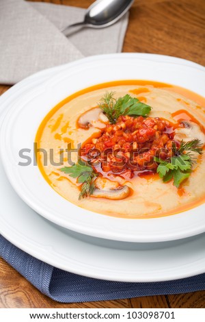 pumpkin soup with coconut milk, champignon and vegetable ragout