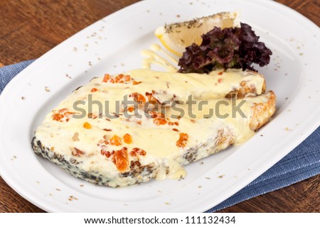 grilled salmon with white caviar sauce
