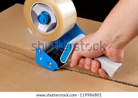 Cardboard boxes stick dispenser for adhesive tape