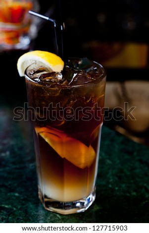 Long Island Iced Tea on the background of the bar